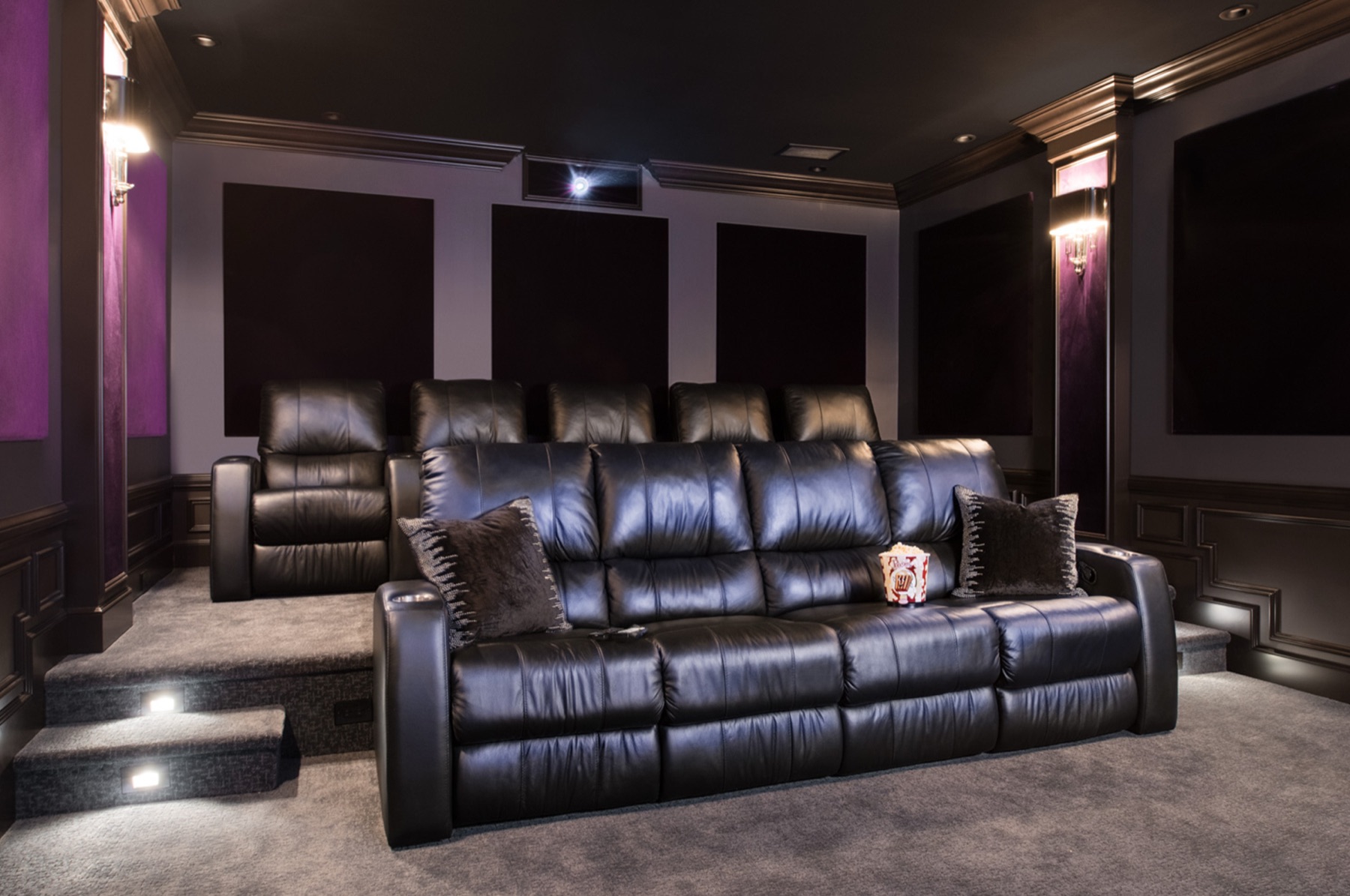 Tiered private home theater with leather recliners